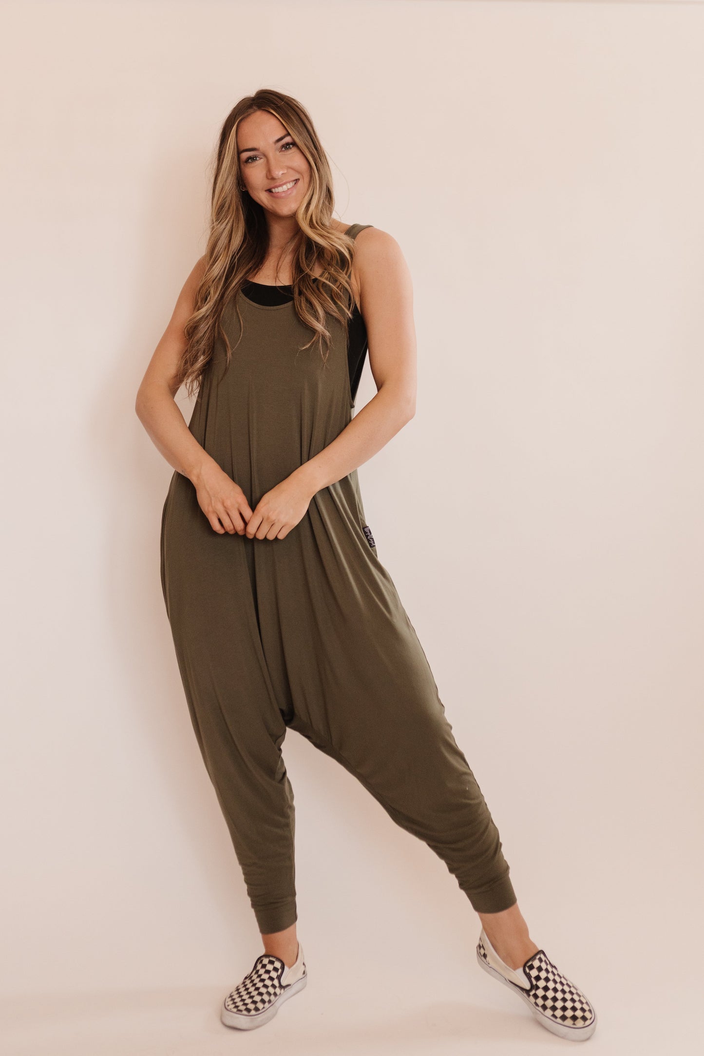 Momper Romper jumpsuit in olive green.