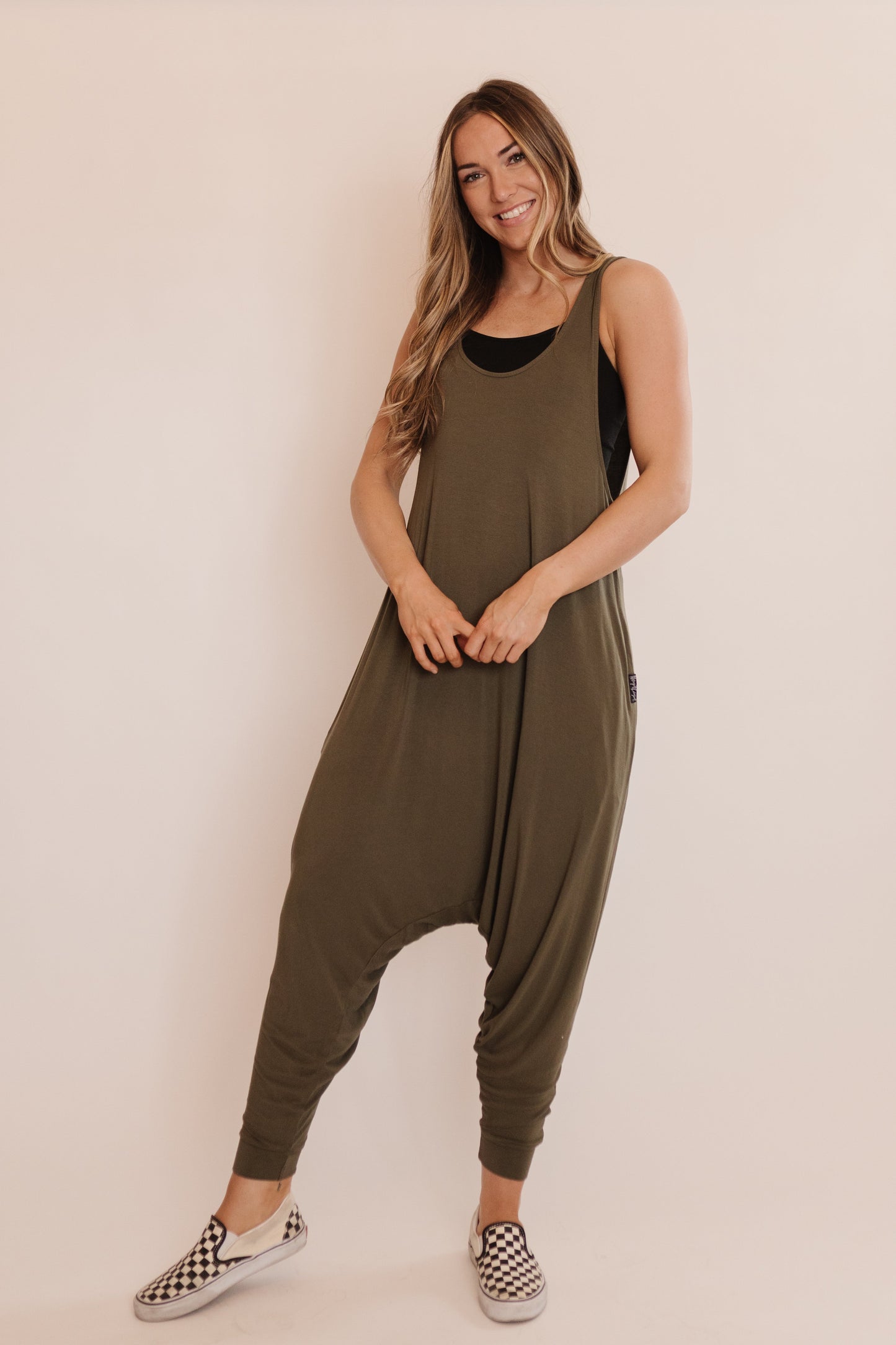 Momper Romper jumpsuit in olive green.