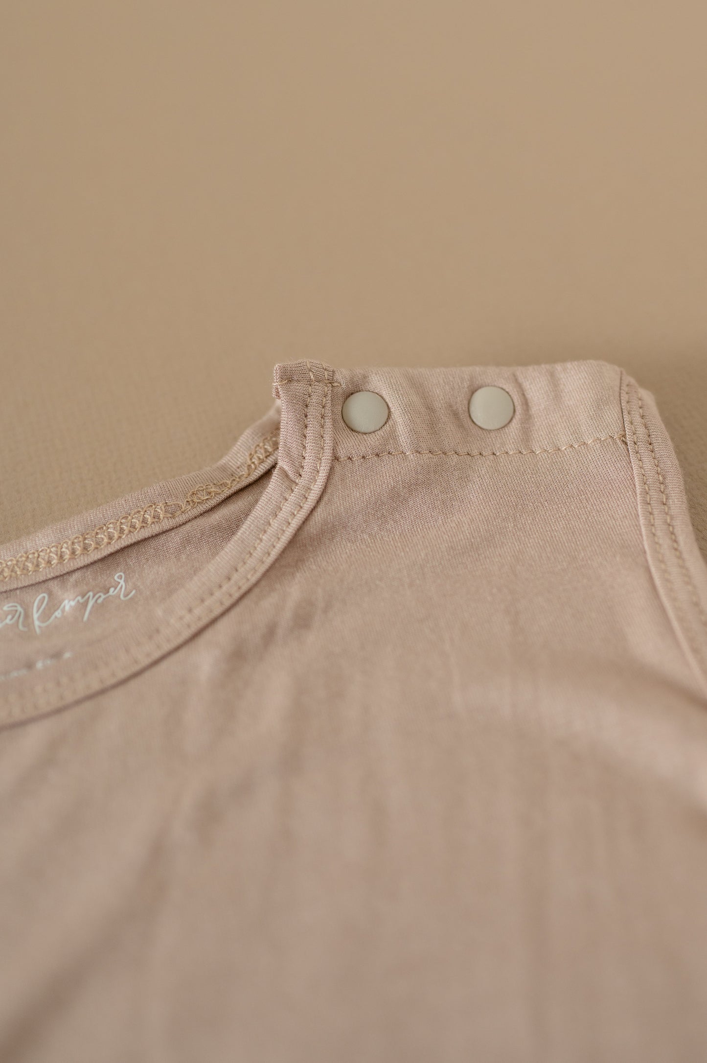 Baby Romper Romper Jumpsuit in Taupe.