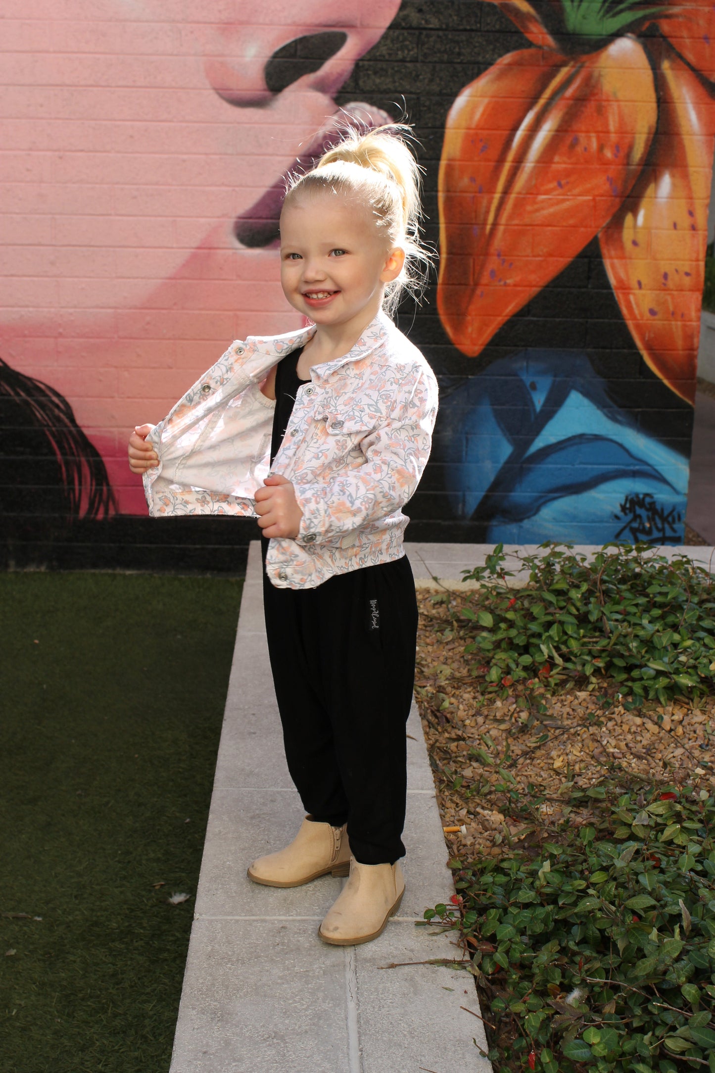 Mini Momper Romper for toddler girls in black.