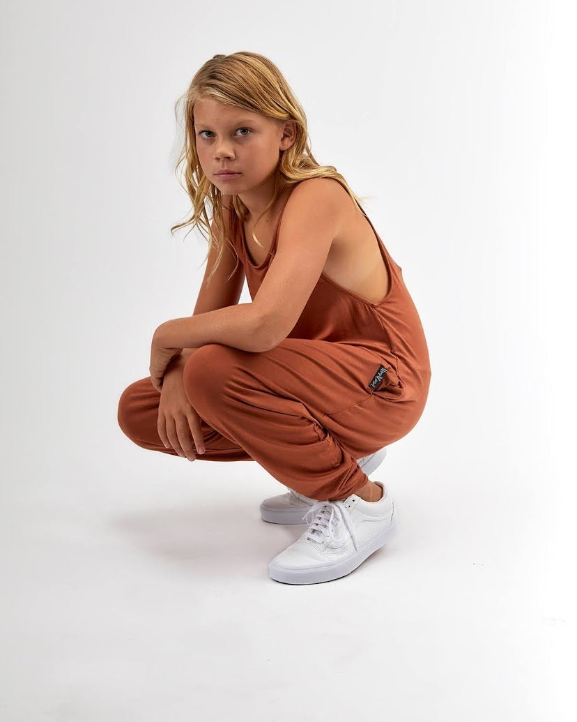 Big Kids Momper Romper in Terra Burnt Orange.