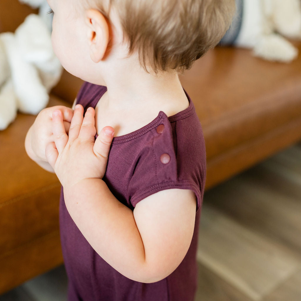 Baby Momper Romper in desert rose purple.