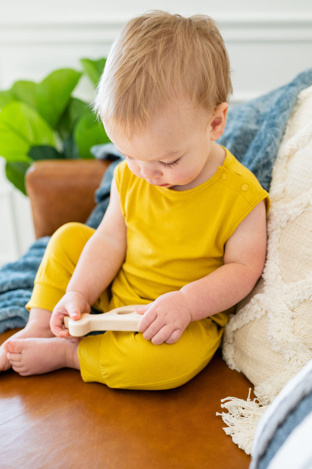 Mustard yellow baby Momper Romper.