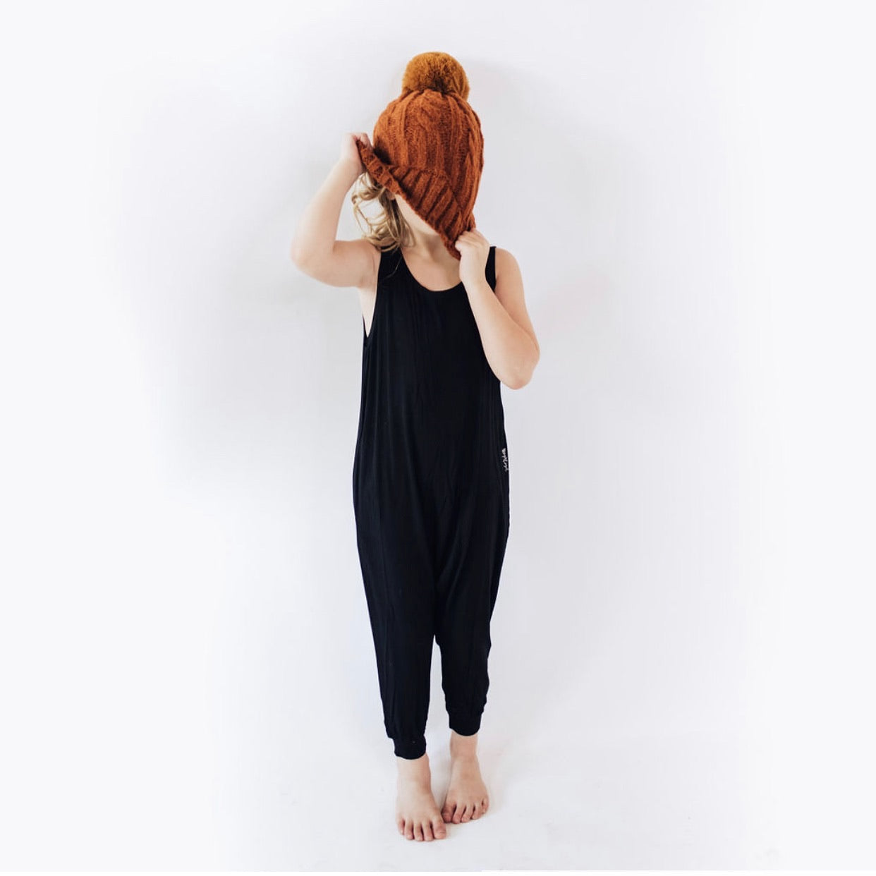 Kids romper in black.