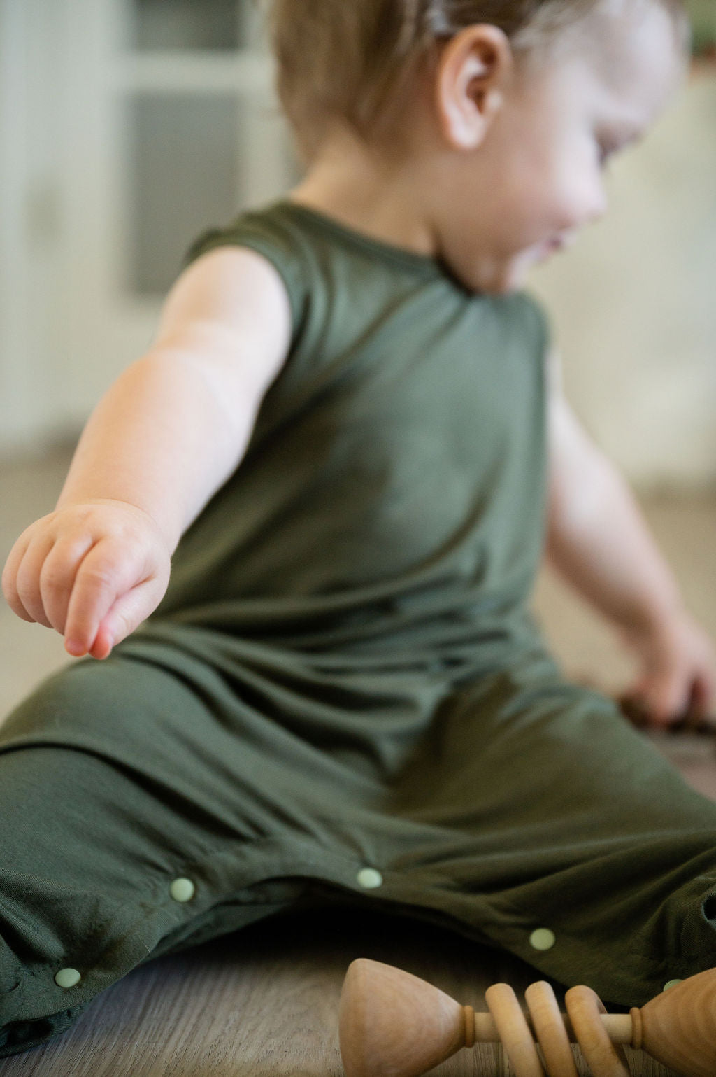 Olive green baby Momper Romper.