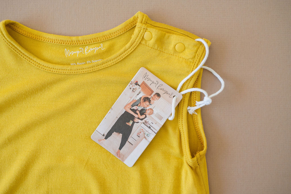 Mustard yellow baby Momper Romper.