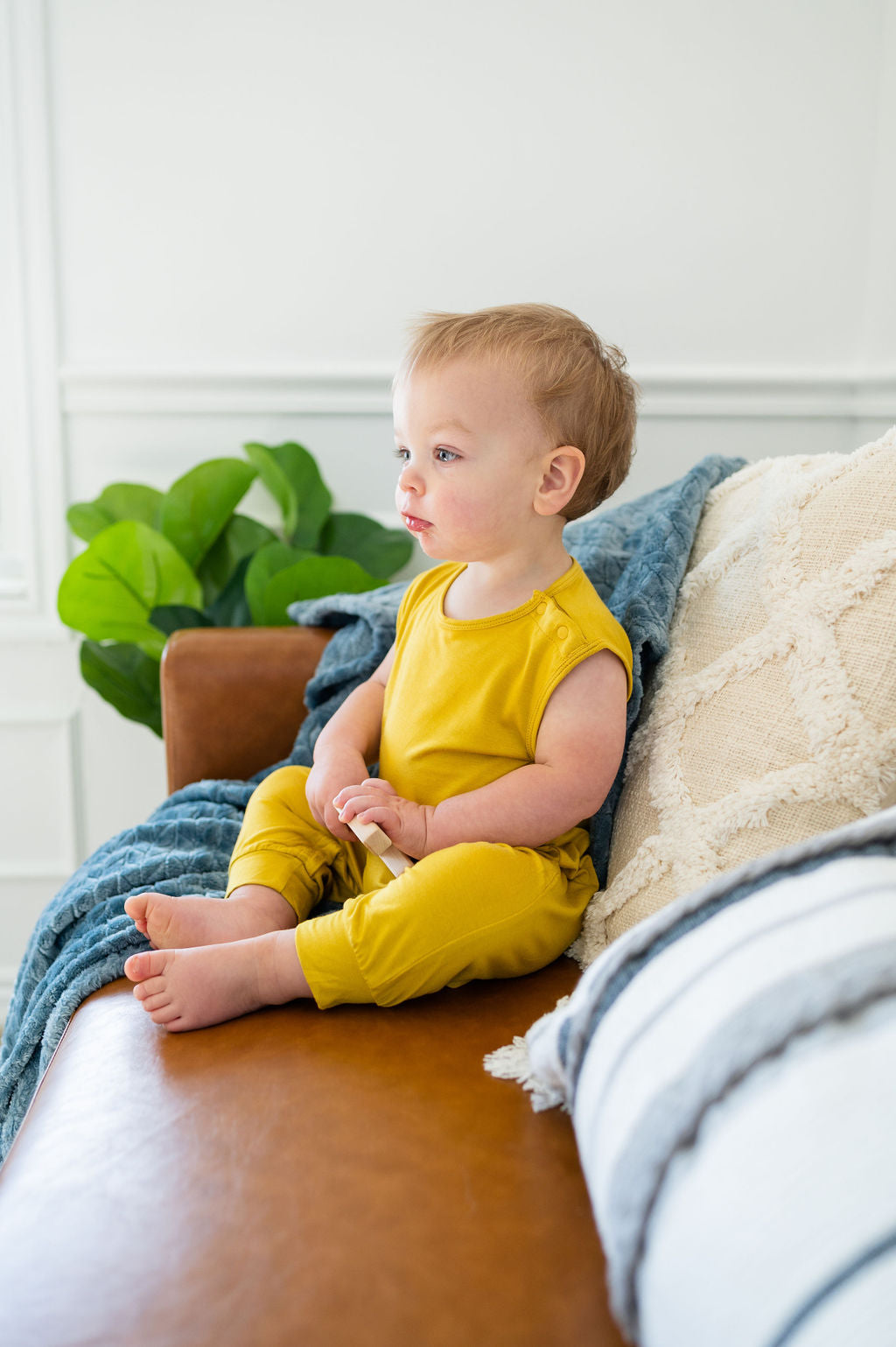 Mustard yellow baby Momper Romper.