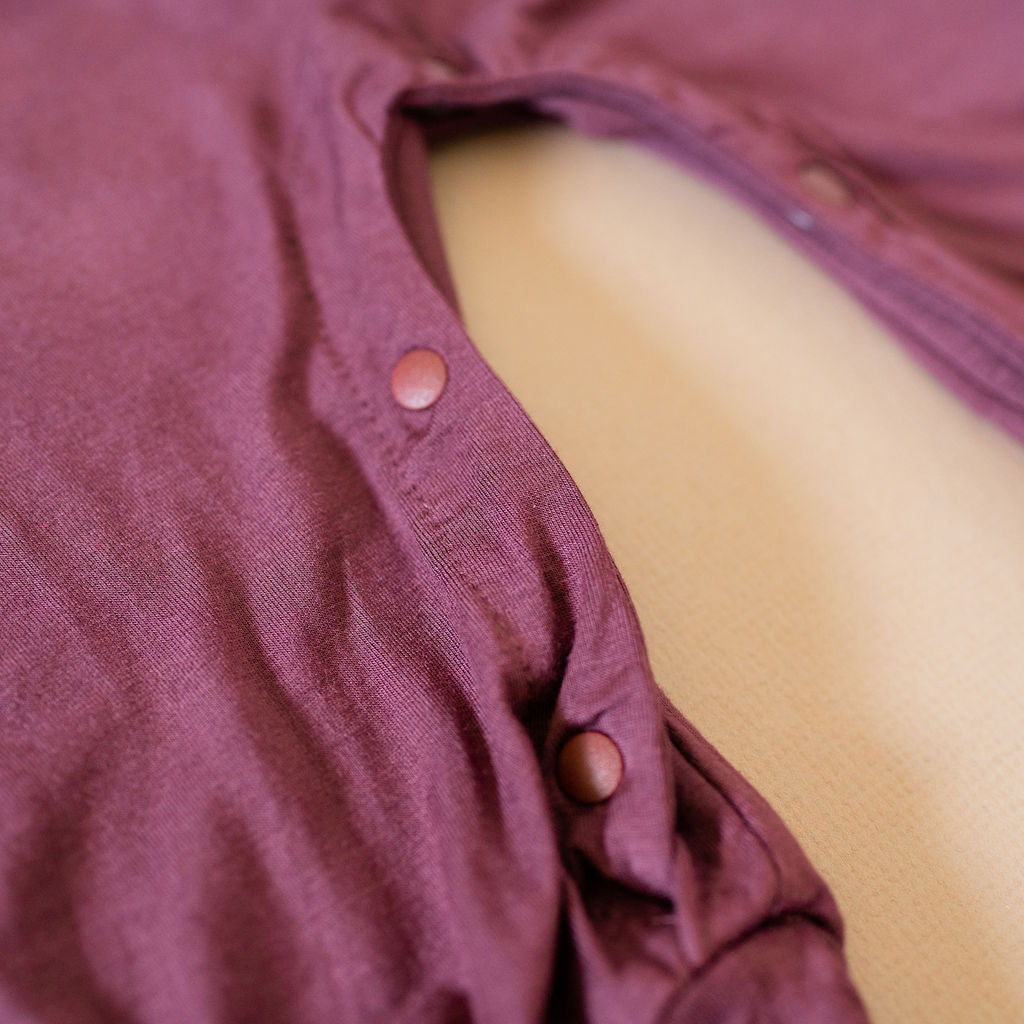 Baby Momper Romper in desert rose purple.