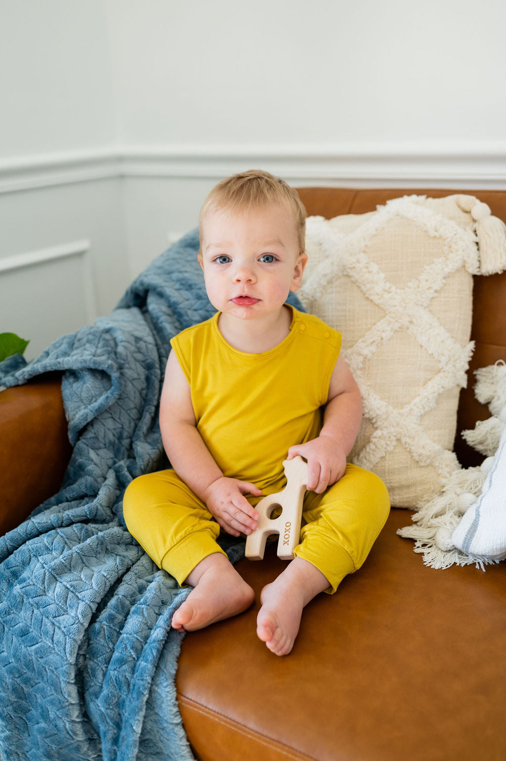 Mustard yellow baby Momper Romper.